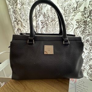 Chic Black Leather Satchel by [Brand]